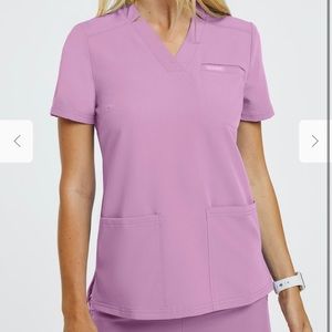 Gorgeous Jaanuu Women’s  scrubs. Mauve color. Super comfortable. Worn once.